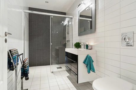 A bathroom with porcelain tiles.